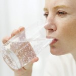 Woman Drinking Water from a Glass